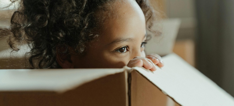 a young girl in an apartment facing hidden challenges of interstate apartment moves