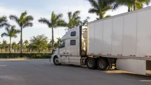Moving truck is parked in a Florida parking lot.