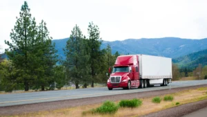 A long-distance moving truck transports household belongings across the country.